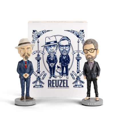 Reuzel Founders' Bobble Heads featuring two collectible figurines with detailed faces and branded attire, perfect for display. Rob & Leen